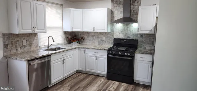 a bathroom with a sink toilet and vanity