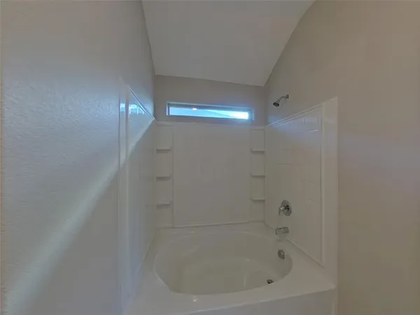 a close up of a bathtub