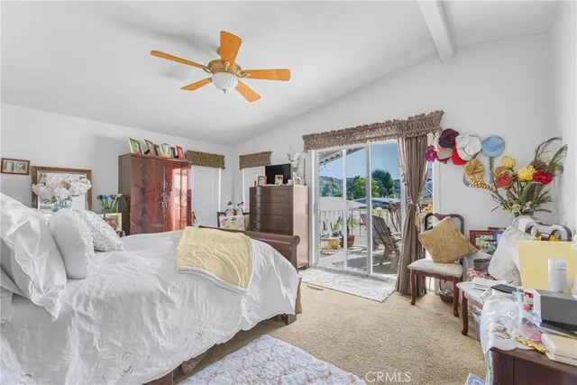 a bed room with a bed and a window