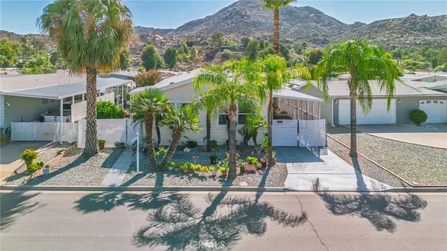 a view of a city with mountains in the background