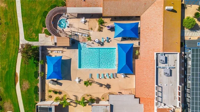 an aerial view of residential houses and outdoor space