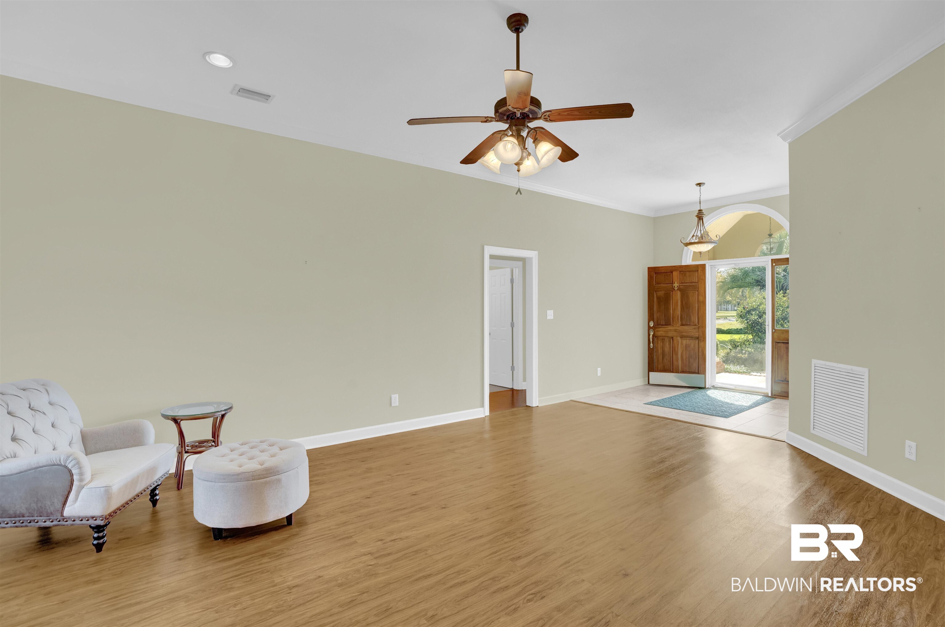 100 Conti Court Fairhope, AL 36532 - Photo 17 of 54 Living area featuring ceiling fan, light hardwood / wood-style floors, and ornamental molding