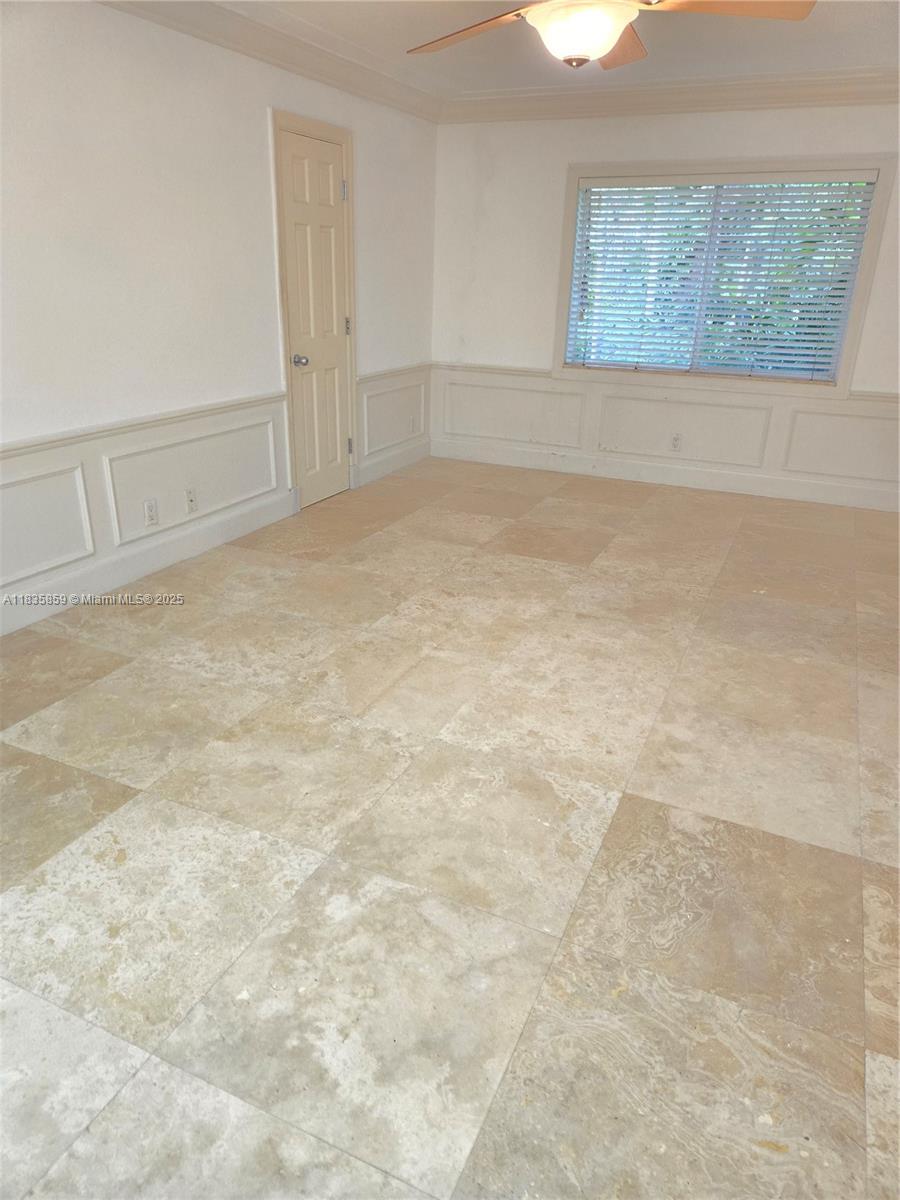 7895 Southwest 122nd Street Pinecrest, FL 33156 - Photo 37 of 78 an empty room with a natural light