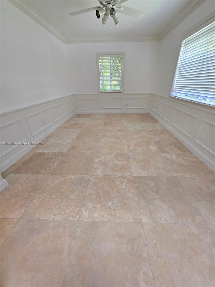 7895 Southwest 122nd Street Pinecrest, FL 33156 - Photo 47 of 78 an empty room with a window