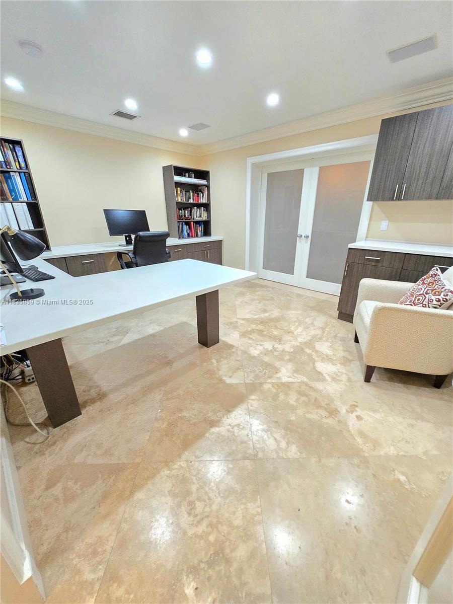 7895 Southwest 122nd Street Pinecrest, FL 33156 - Photo 54 of 78 a view of a room with gym equipment