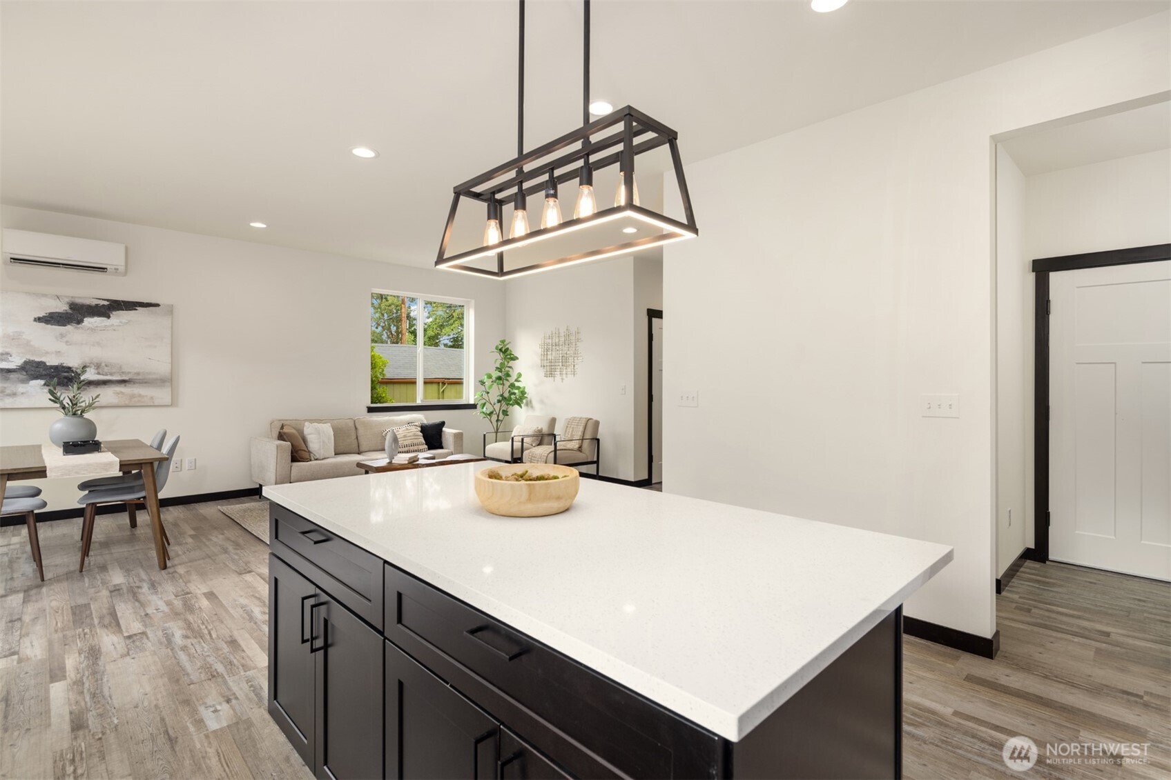 9245 Kelsey Lane Southwest Seattle, WA 98106 - Photo 11 of 33 a view of a kitchen area with furniture and wooden floor
