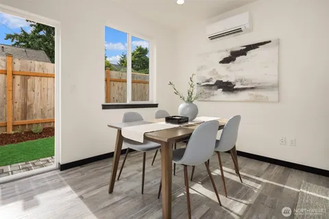 a view of a chair and tables in the backyard
