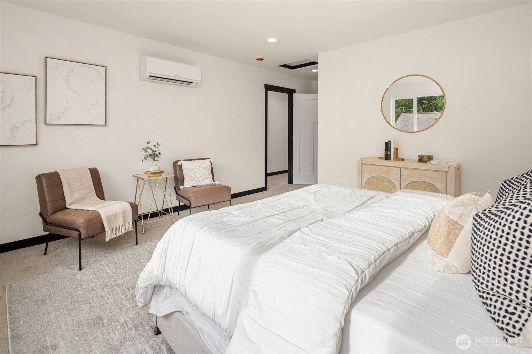 9245 Kelsey Lane Southwest Seattle, WA 98106 - Photo 22 of 33 a bedroom with bed and a large mirror