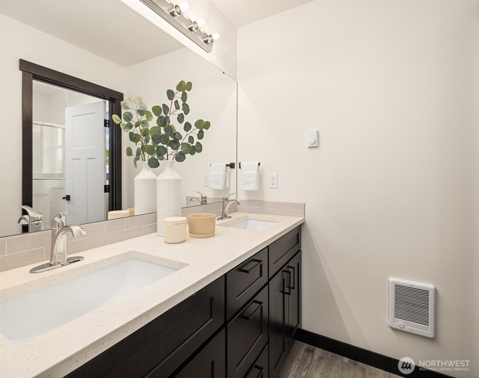 9245 Kelsey Lane Southwest Seattle, WA 98106 - Photo 28 of 33 a bathroom with a sink and a mirror