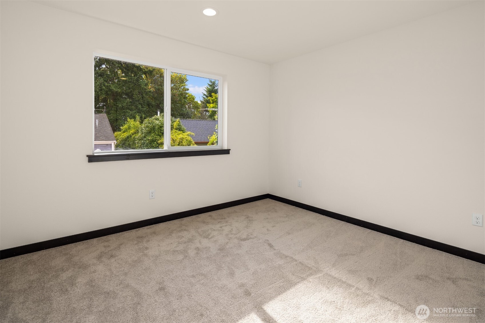 9245 Kelsey Lane Southwest Seattle, WA 98106 - Photo 30 of 33 an empty room with a window