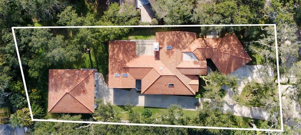 4895 Sailfish Drive Ponce Inlet, FL 32127 - Photo 33 of 34 an aerial view of house with swimming pool outdoor seating and entertaining space