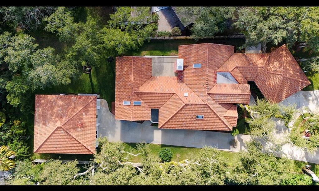 4895 Sailfish Drive Ponce Inlet, FL 32127 - Photo 34 of 34 an aerial view of a house with yard swimming pool and outdoor seating