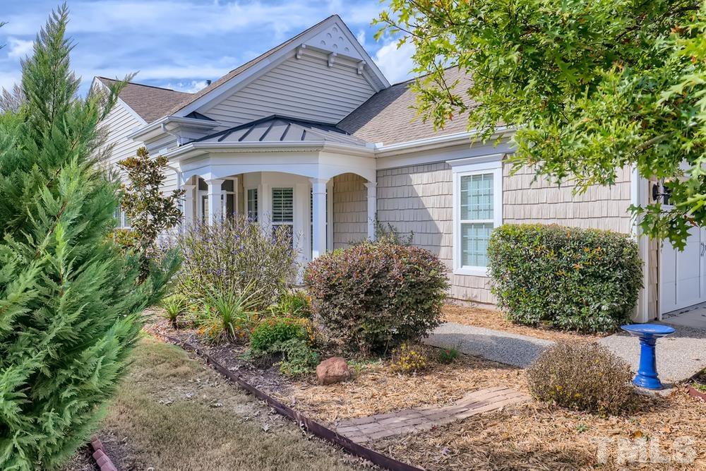 564 Tomkins Loop Cary, NC 27519 - Photo 2 of 28 a front view of a house with garden