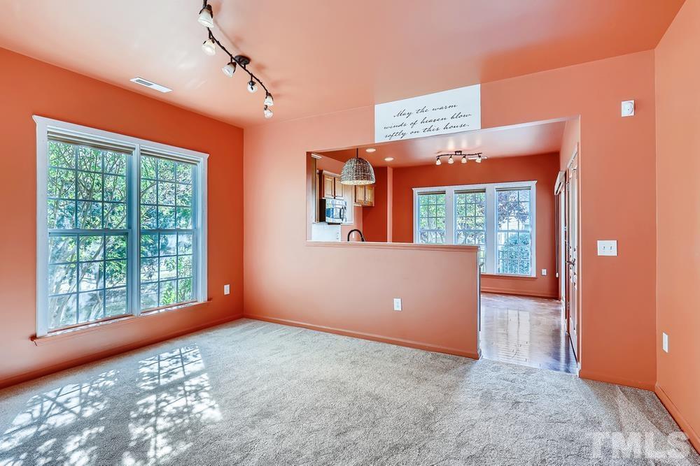 564 Tomkins Loop Cary, NC 27519 - Photo 13 of 28 a view of an empty room with a window