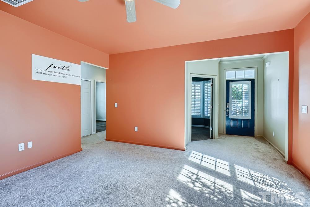 564 Tomkins Loop Cary, NC 27519 - Photo 4 of 28 a view of a room with an empty space