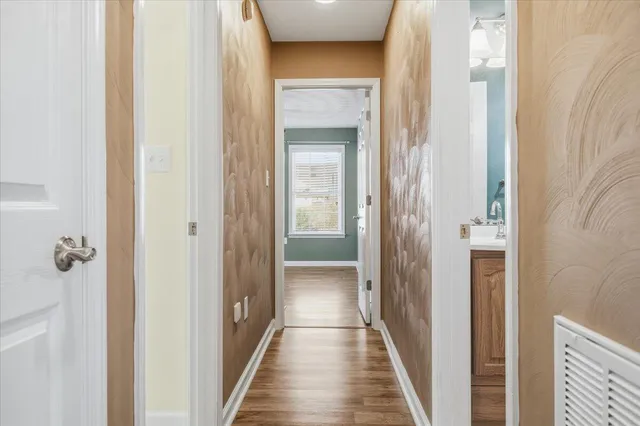 a view of a storage & utility room with two washing machine