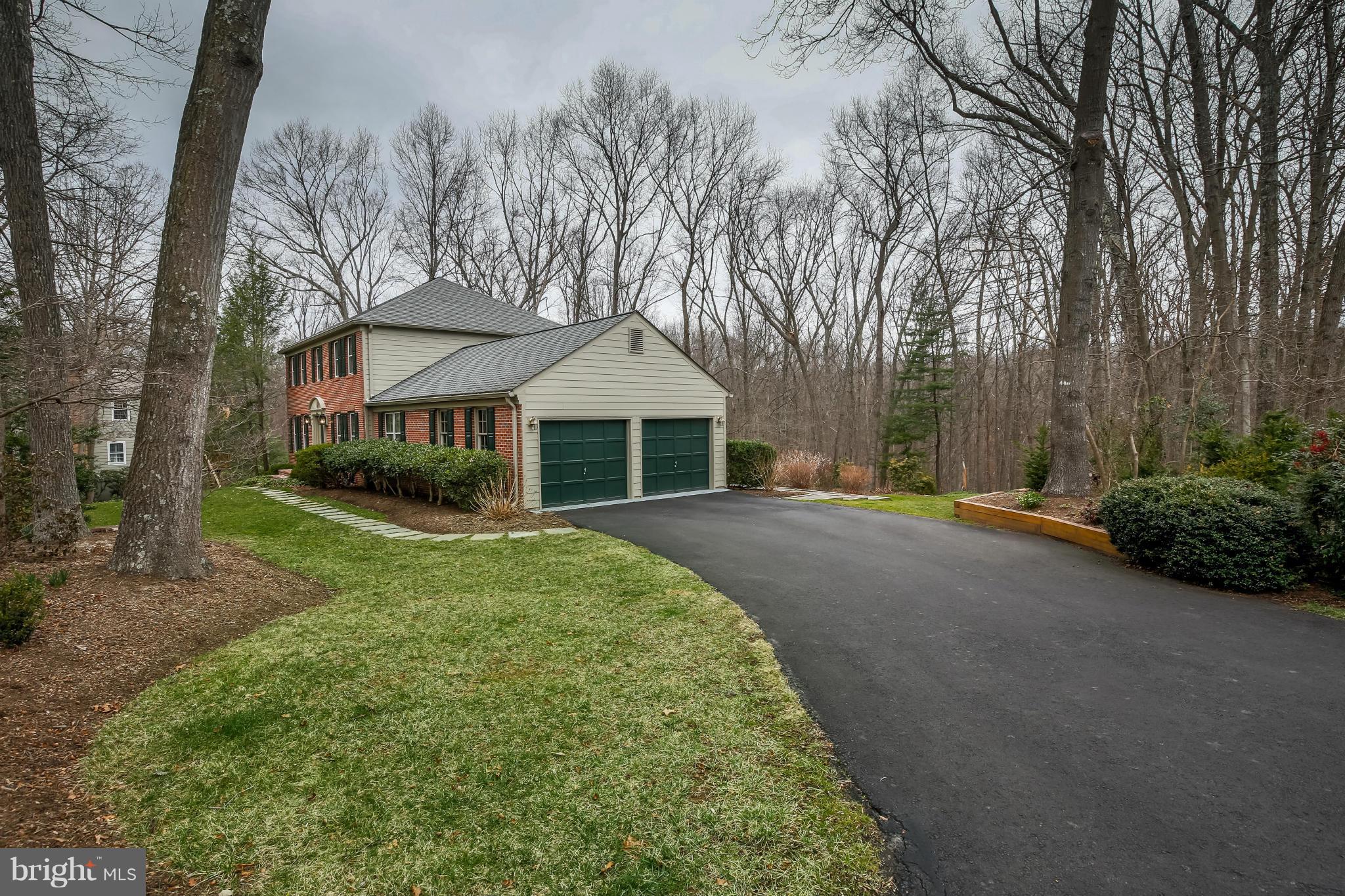 11006 Birdfoot Court Reston, VA 20191 - Photo 26 of 30 front view of a house with a yard