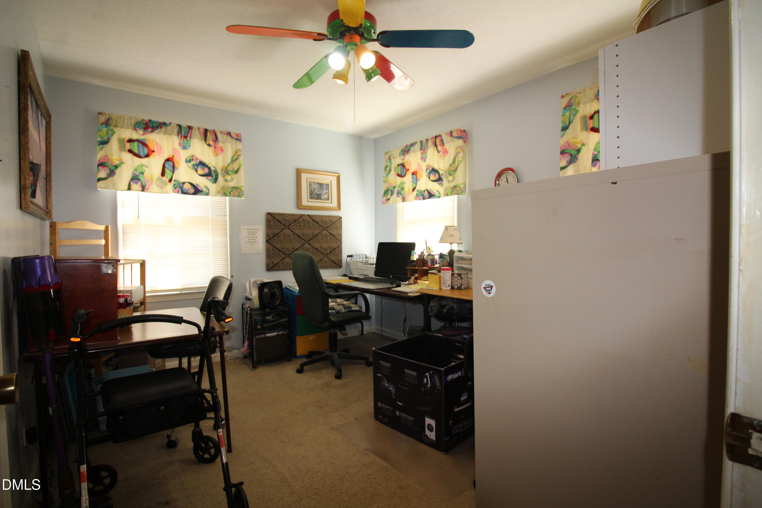56 Ash Street Coats, NC 27521 - Photo 23 of 28 a view of a workspace with furniture and a window