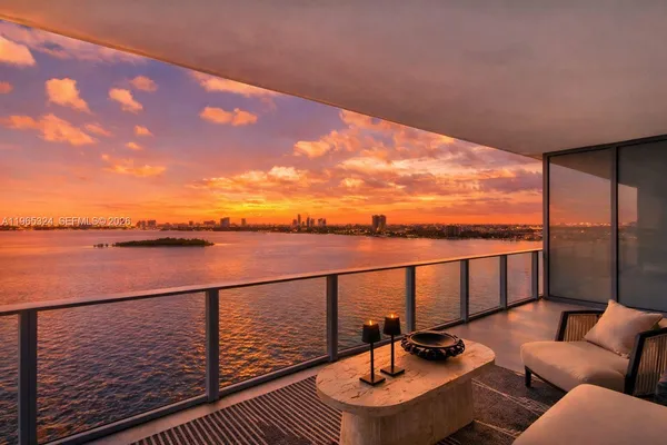 a bed room with a bed and a couch