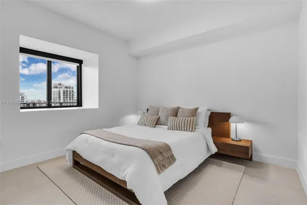 a view of a hallway with washer and dryer