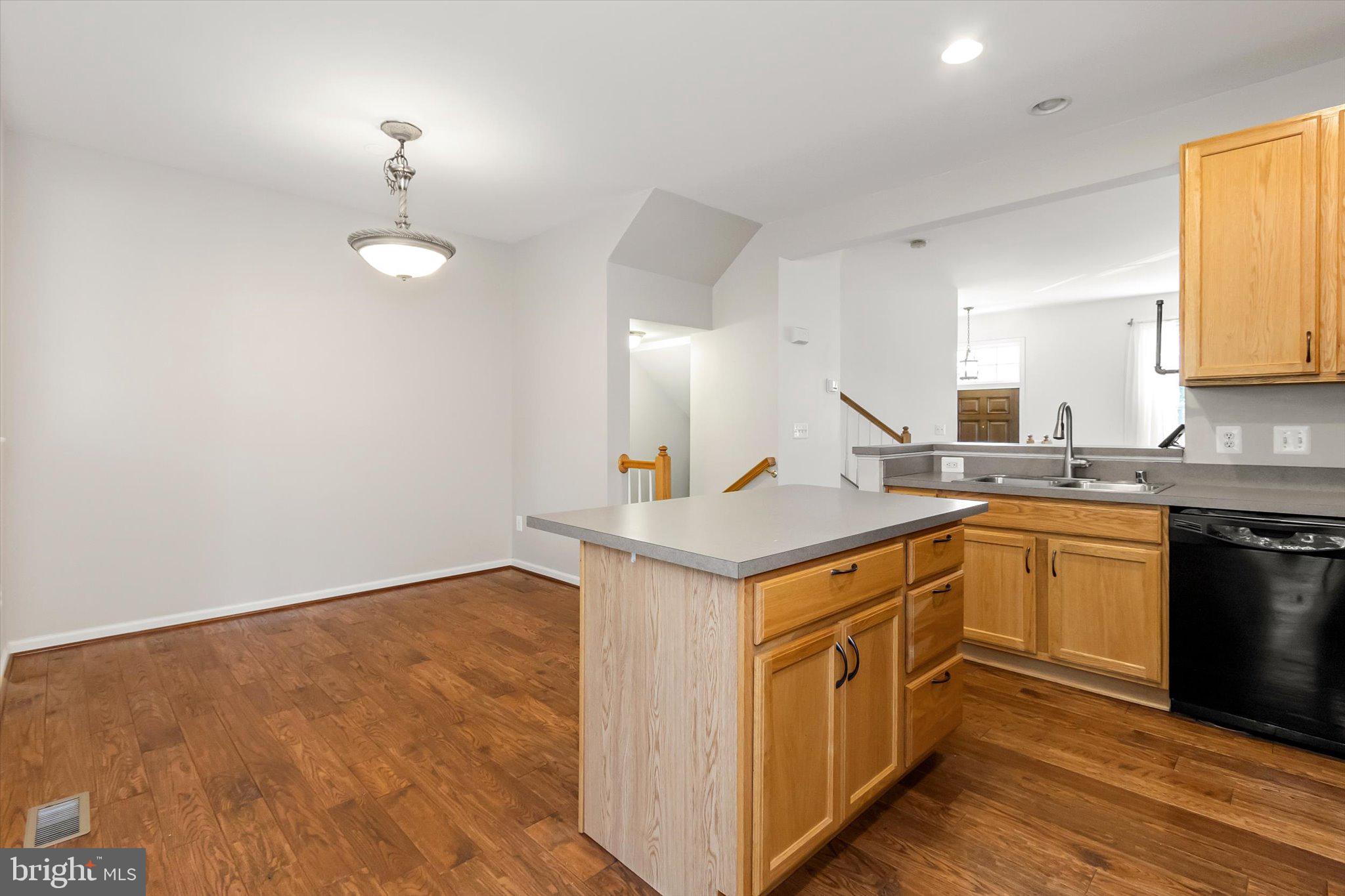 171 Riparian Lane Ranson, WV 25438 - Photo 23 of 53 Kitchen into Breakfast Area