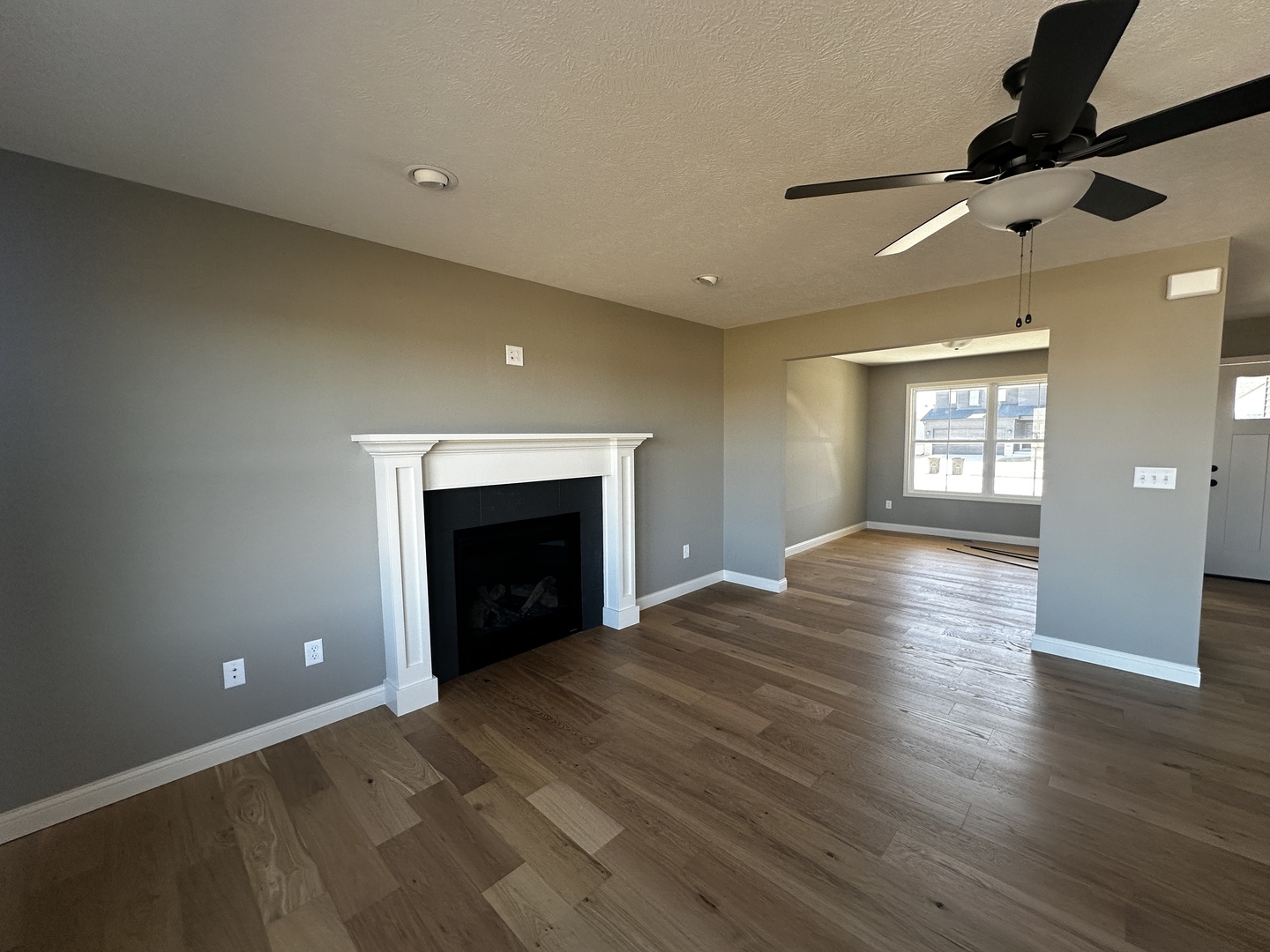 1710 Bluestone Drive Normal, IL 61761 - Photo 5 of 18 a view of an empty room with window and fire place