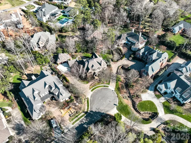 an aerial view of residential house with outdoor space