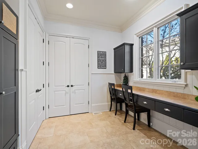a view of a livingroom with furniture and window