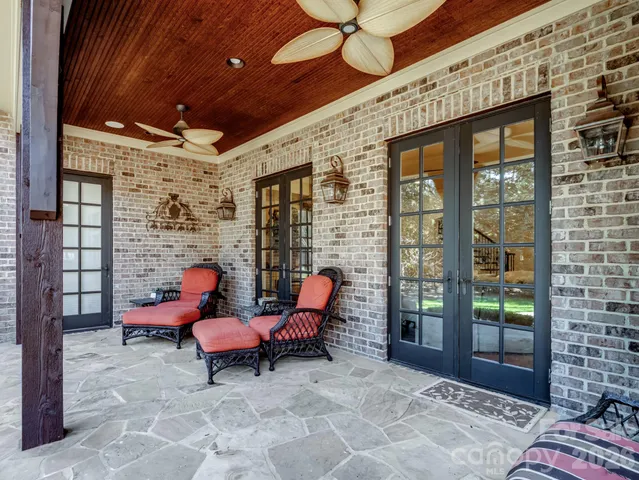 a outdoor space with patio furniture and a fireplace