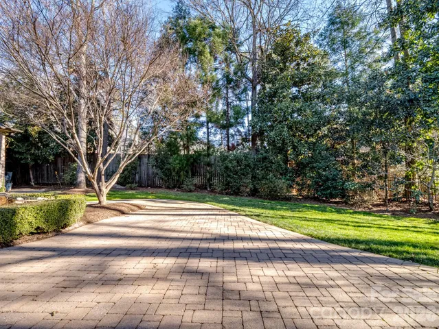 a view of a yard in front of a house