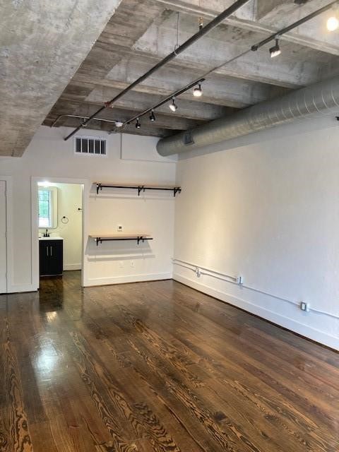 4411 Dallas Street, Unit 1 Houston, TX 77023 - Photo 5 of 13 an empty room with wooden floor