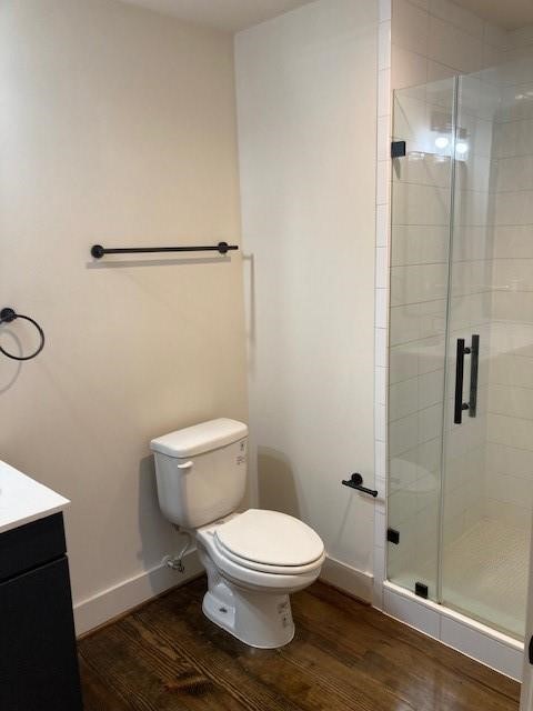4411 Dallas Street, Unit 1 Houston, TX 77023 - Photo 8 of 13 a white toilet sitting next to a bathroom sink