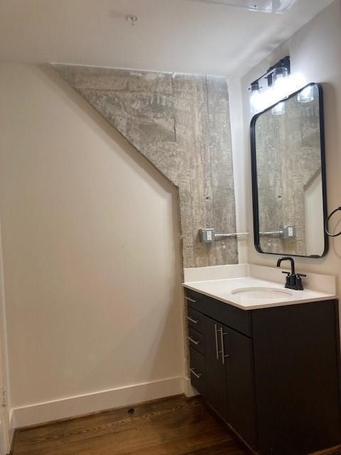 4411 Dallas Street, Unit 1 Houston, TX 77023 - Photo 9 of 13 a bathroom with a sink and a mirror