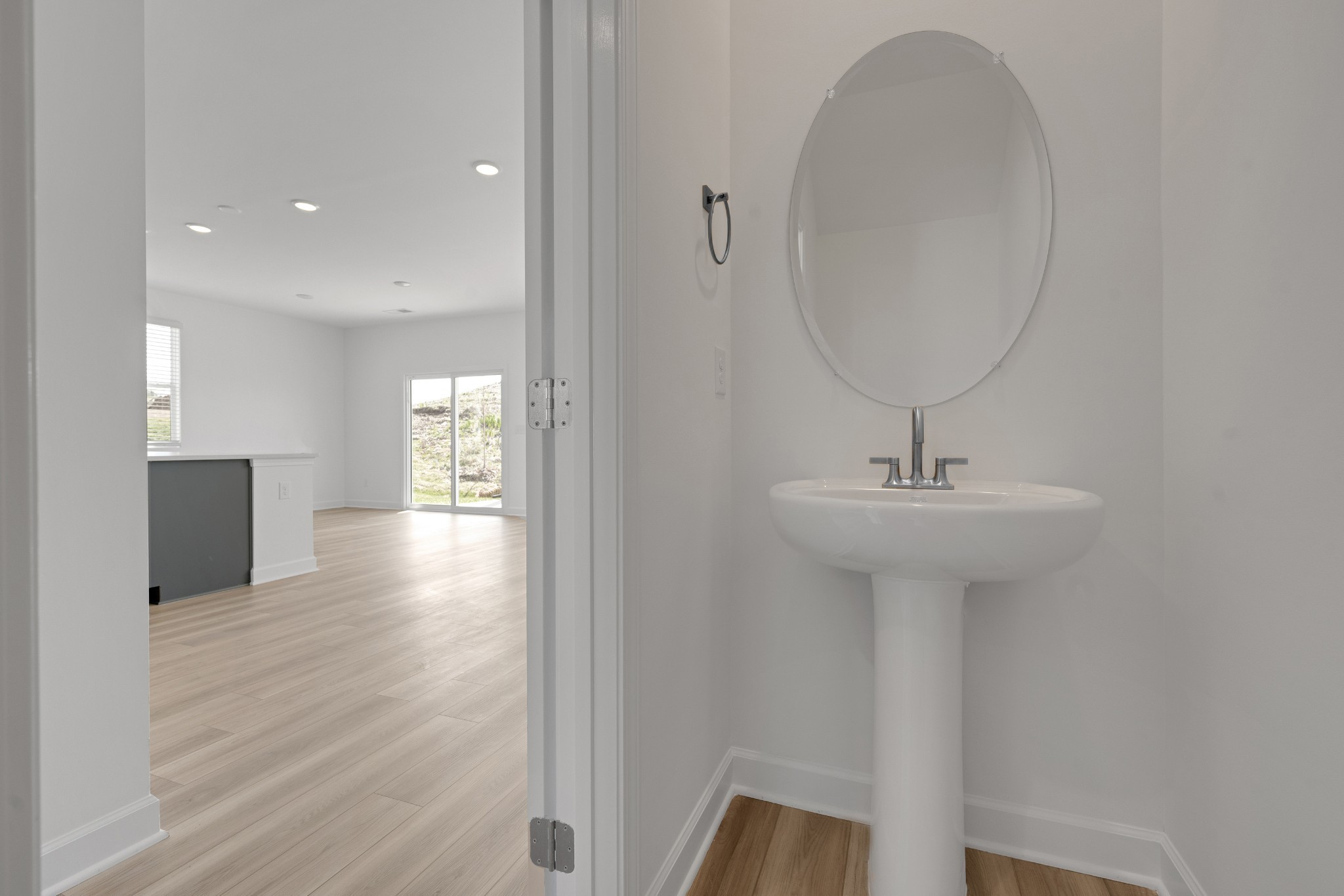 199 East Millbrook Drive Spring Hill, TN 37174 - Photo 13 of 32 a view of a sink and a mirror