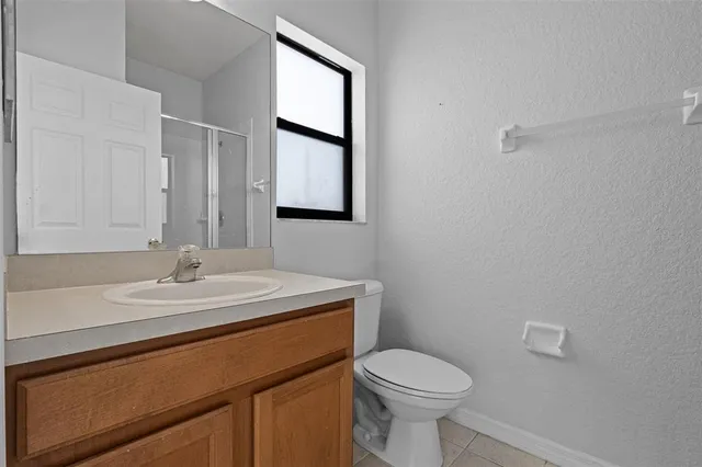 a view of pool with a yard