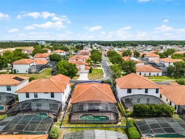 an aerial view of residential building and lake view