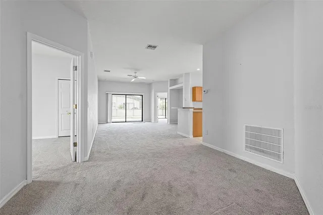 a view of empty room with windows