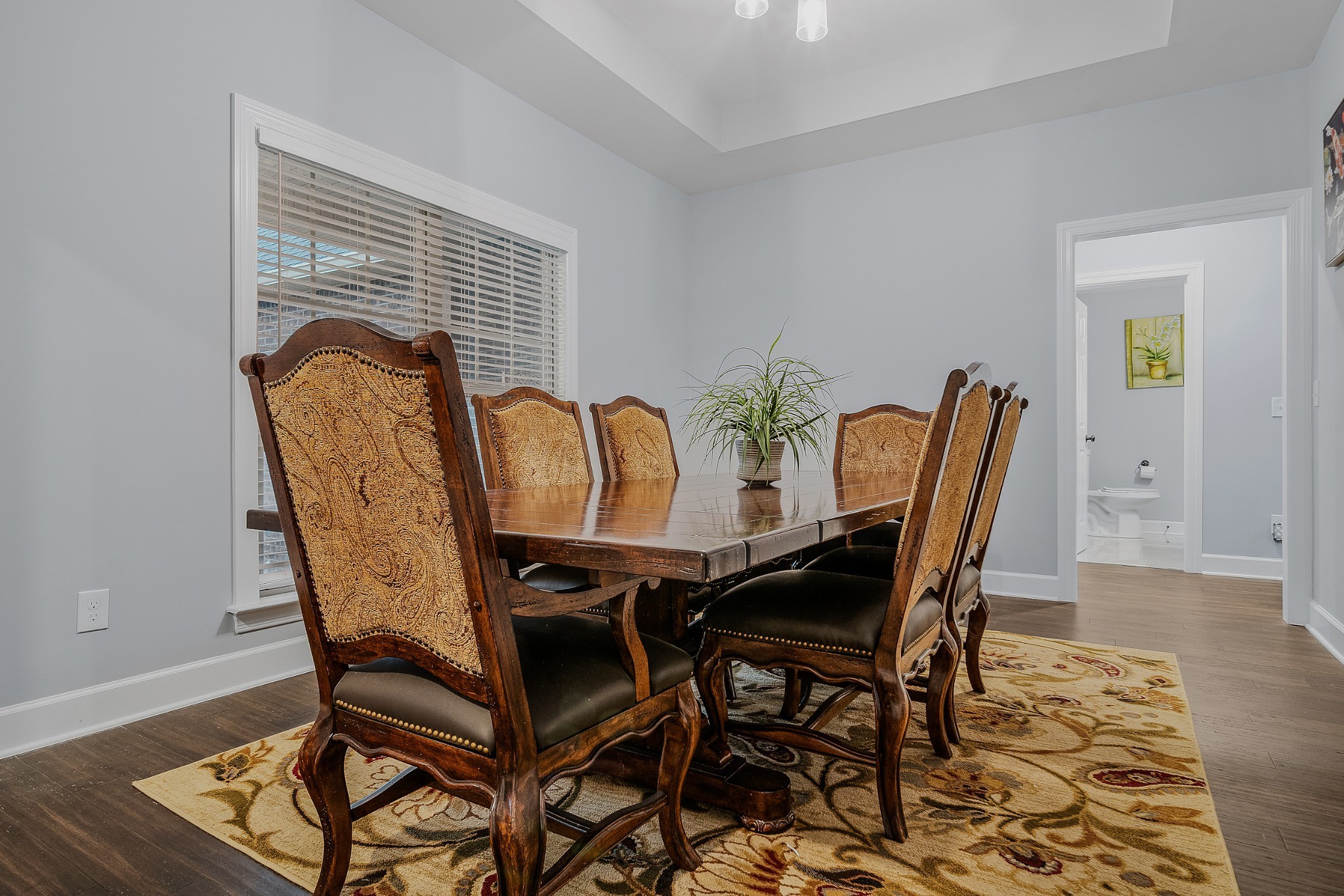 7998 Miller Road Christiana, TN 37037 - Photo 15 of 43 a view of a dining room with furniture and wooden floor