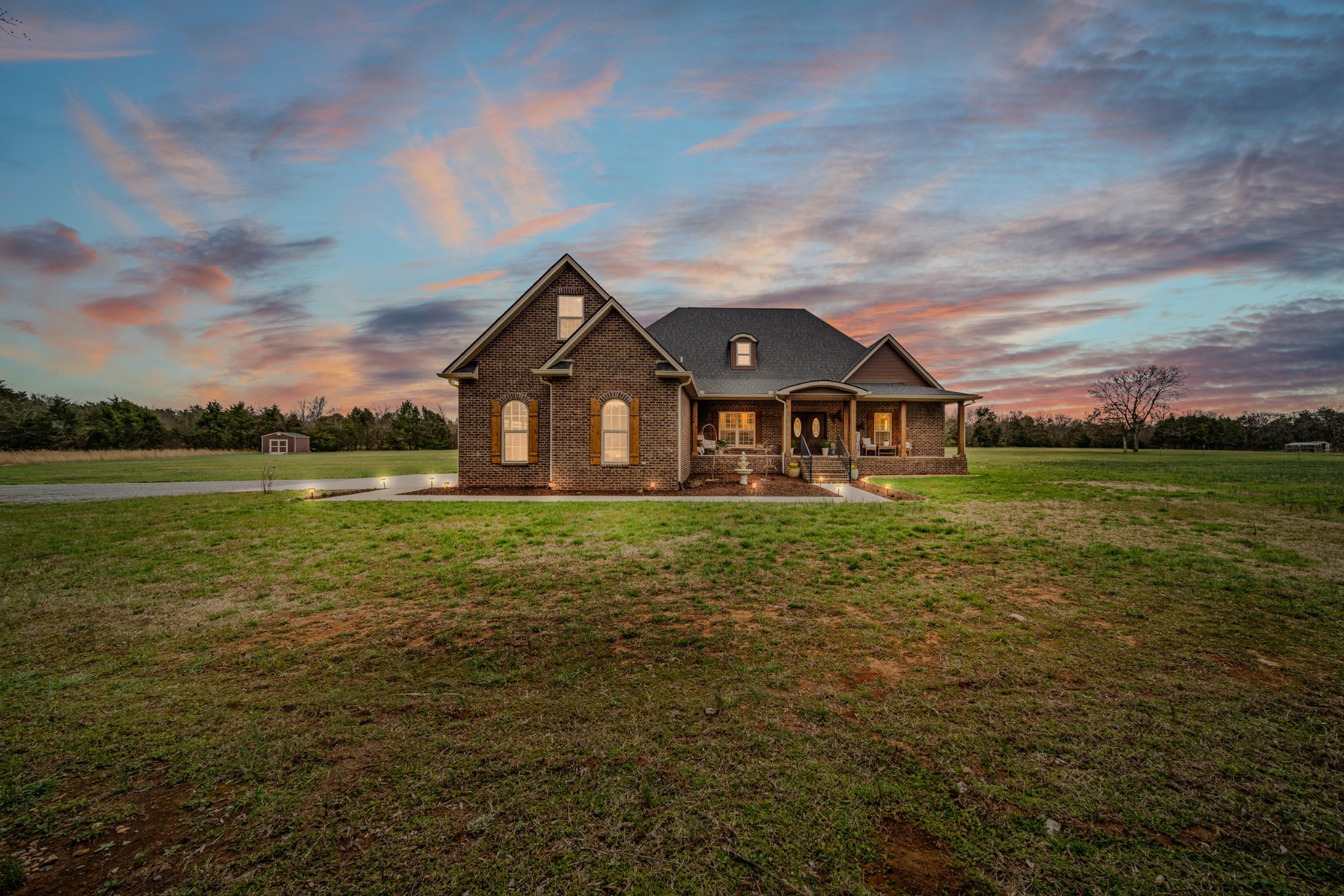 7998 Miller Road Christiana, TN 37037 - Photo 2 of 43 a front view of a house with garden