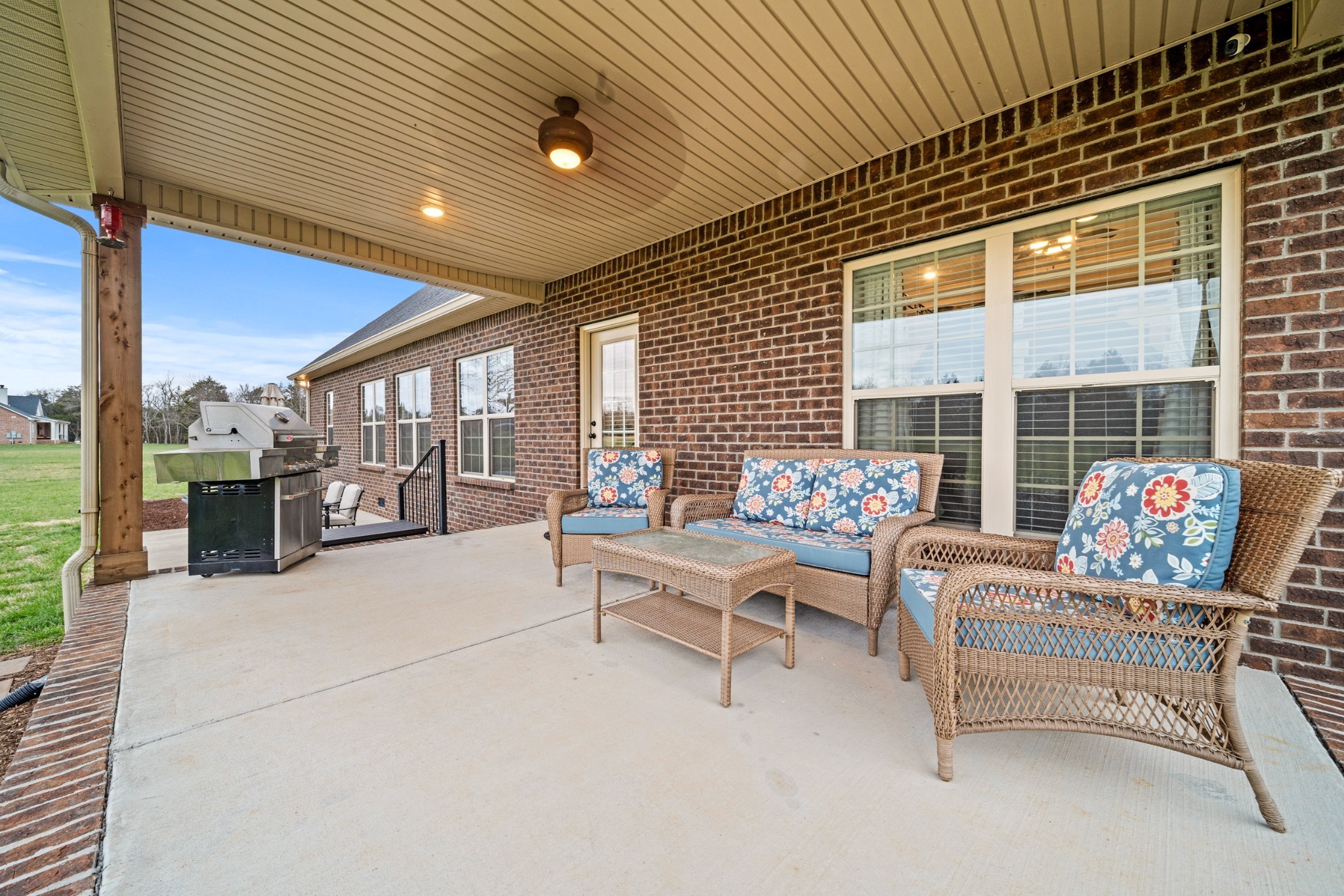 7998 Miller Road Christiana, TN 37037 - Photo 32 of 43 a balcony with furniture and a potted plant