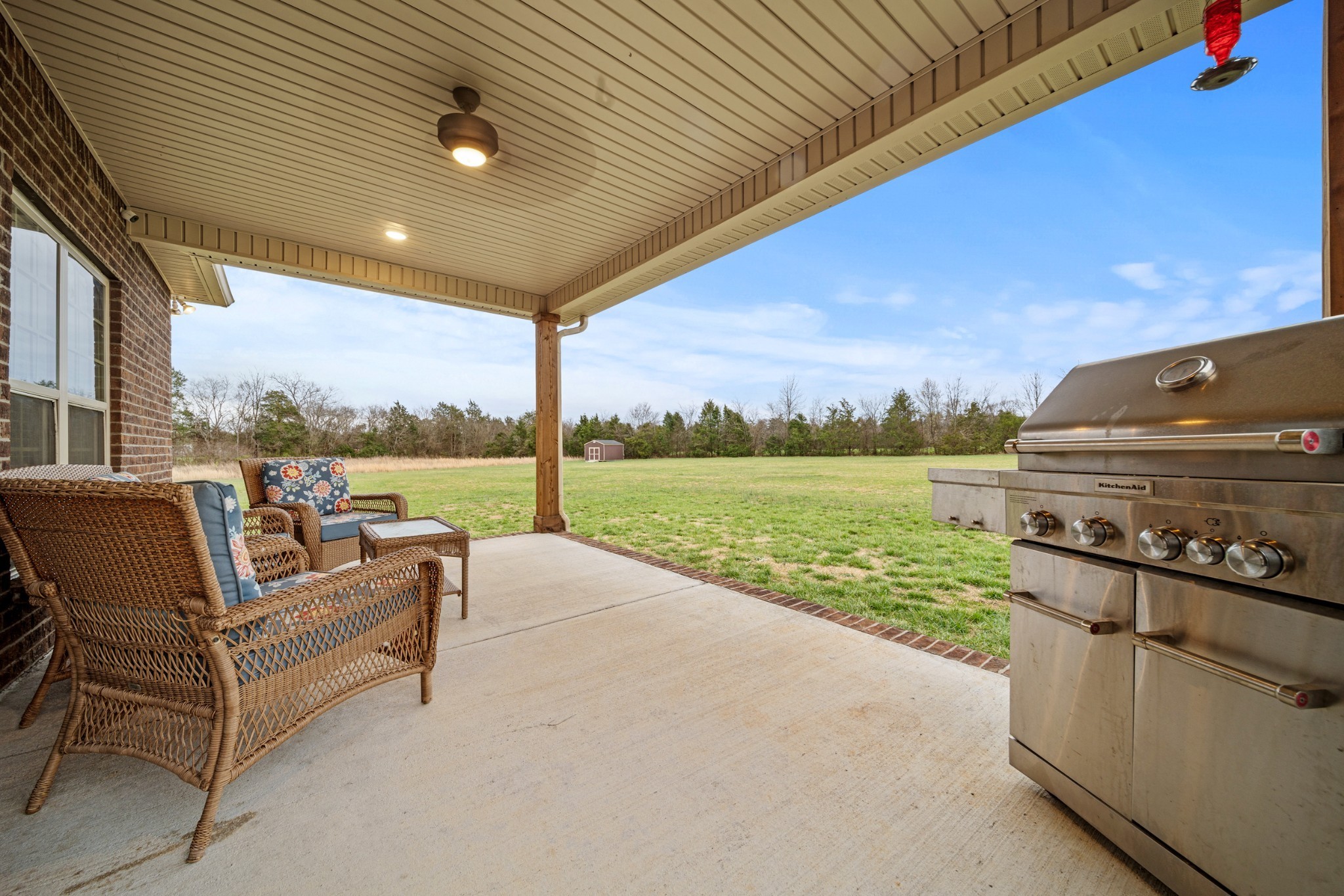 7998 Miller Road Christiana, TN 37037 - Photo 33 of 43 a view of a patio with a table and chairs