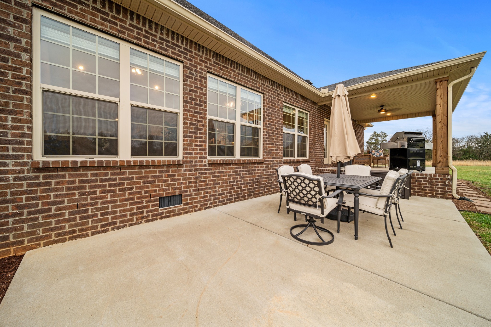 7998 Miller Road Christiana, TN 37037 - Photo 34 of 43 a patio with a table and chairs