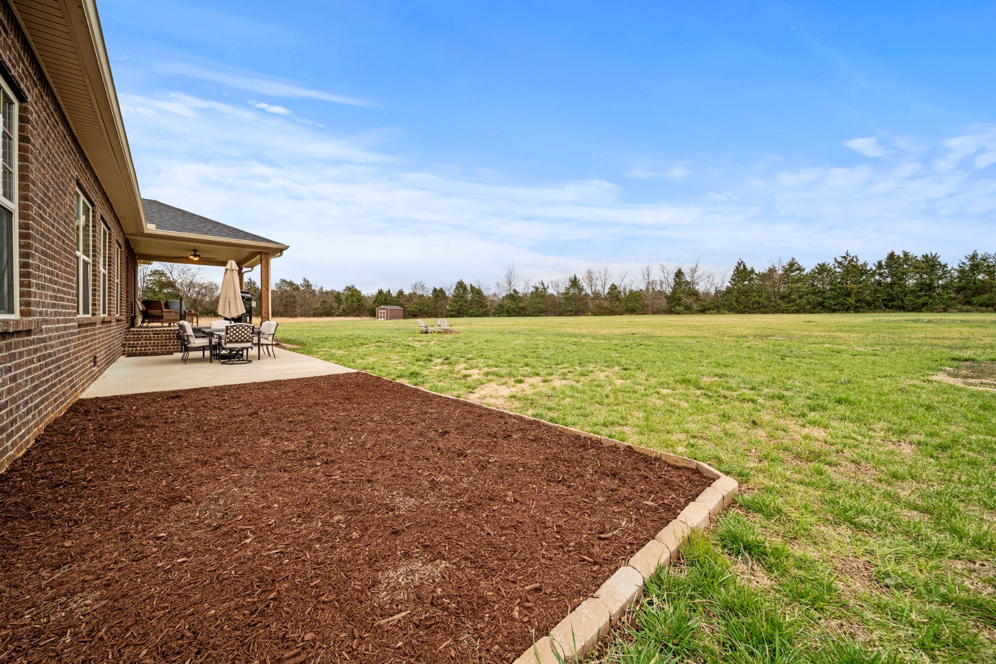 7998 Miller Road Christiana, TN 37037 - Photo 36 of 43 a view of a lake with a big yard