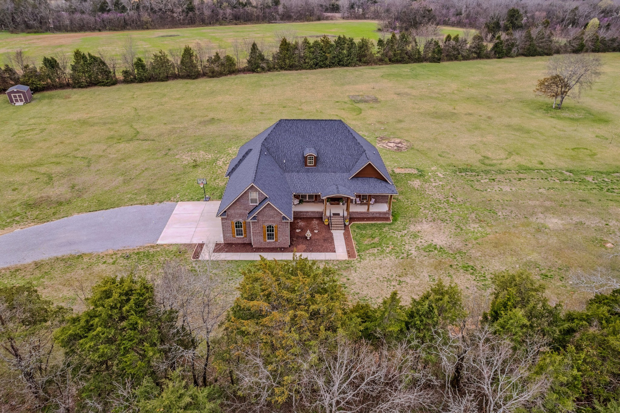 7998 Miller Road Christiana, TN 37037 - Photo 42 of 43 a aerial view of a house with a lake view