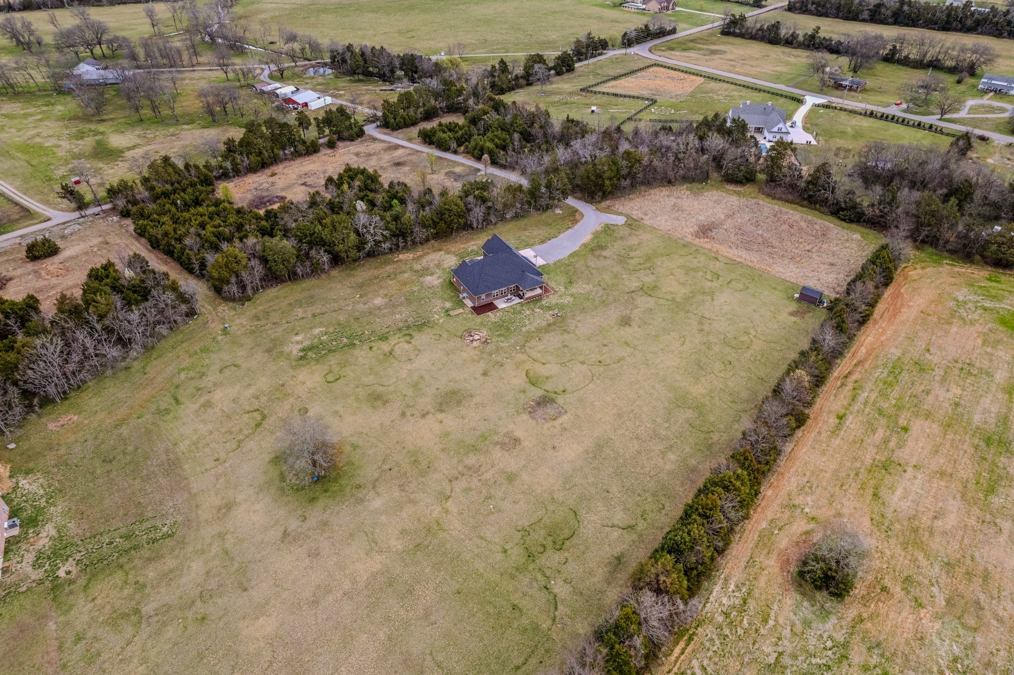 7998 Miller Road Christiana, TN 37037 - Photo 43 of 43 an aerial view of residential houses with outdoor space