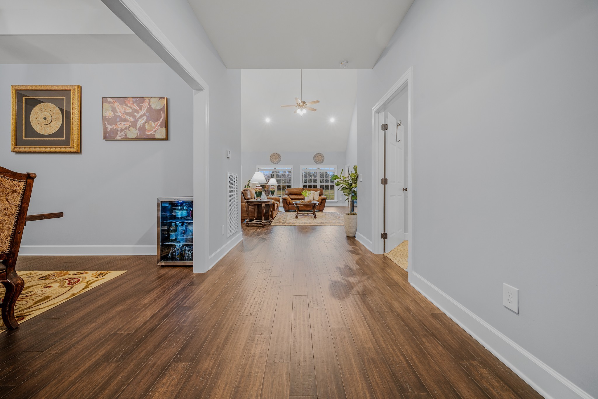 7998 Miller Road Christiana, TN 37037 - Photo 6 of 43 a view of a livingroom with furniture hardwood floor and a ceiling fan