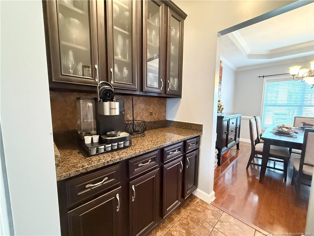 35 Ambrose Point Cameron, NC 28326 - Photo 9 of 31 a kitchen with stainless steel appliances granite countertop a stove and cabinets