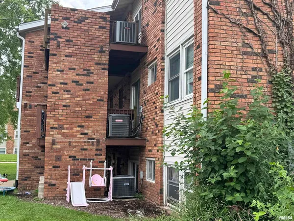 a brick building with a outdoor space