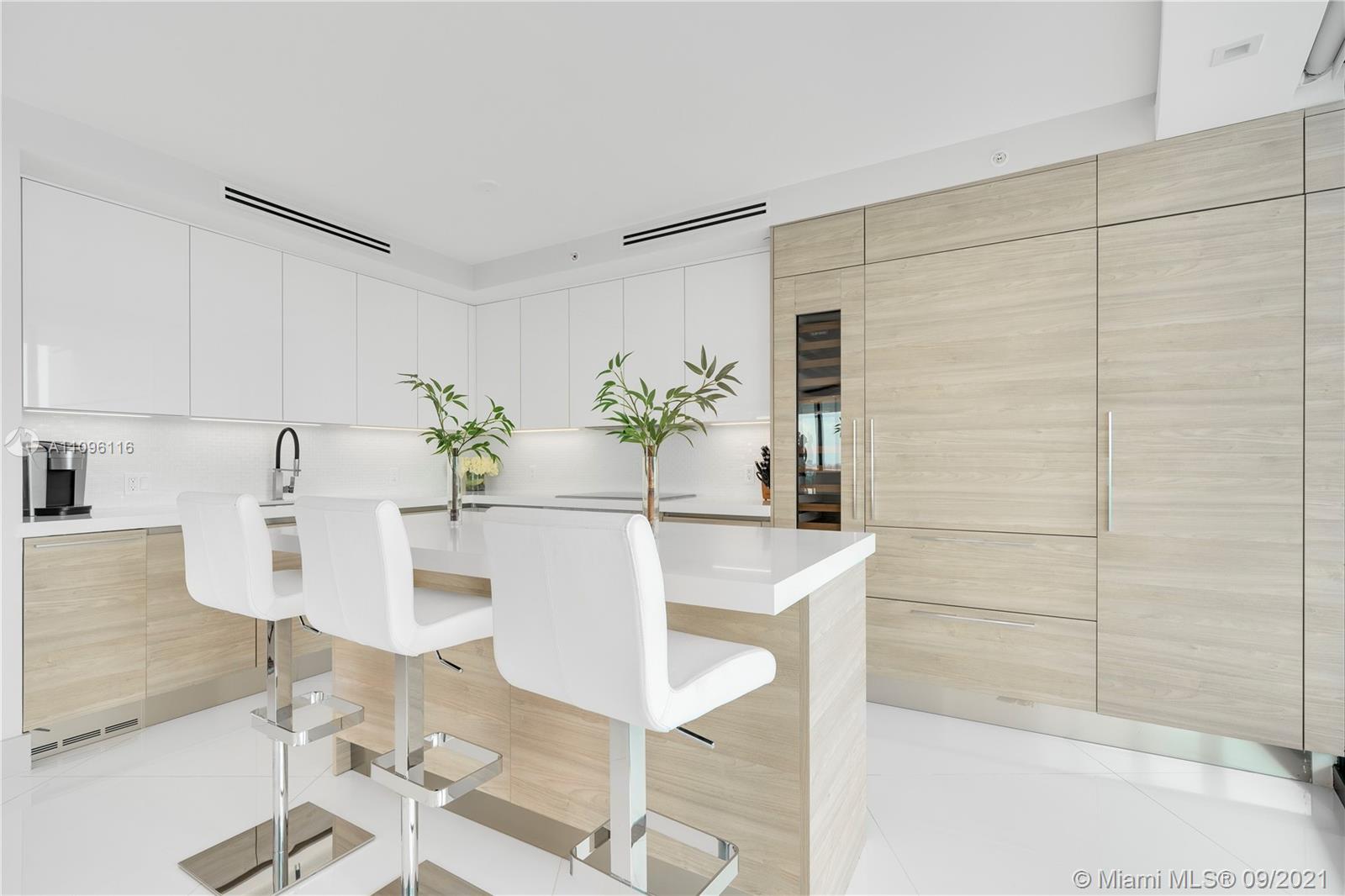 2127 Brickell Avenue, Unit 1602 Miami, FL 33129 - Photo 2 of 40 a view of kitchen with dining area