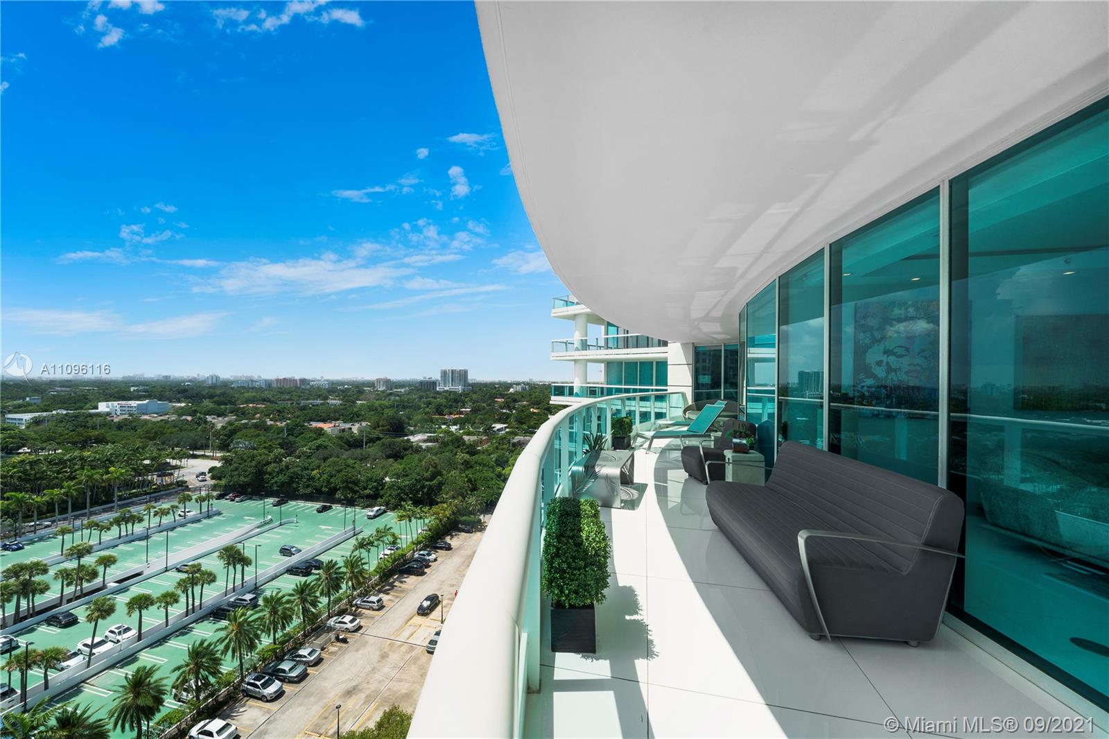 2127 Brickell Avenue, Unit 1602 Miami, FL 33129 - Photo 22 of 40 a balcony with furniture